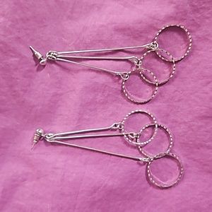 Lightweight 3.5" triple drop shiny, sparkly silvertone post earrings